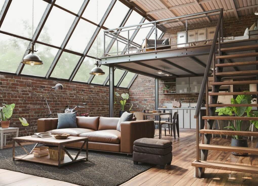 Loft with big windows, brick walls, wooden stairs, and steel elements.